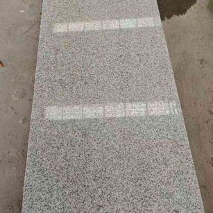 连云港芝麻白光面毛板